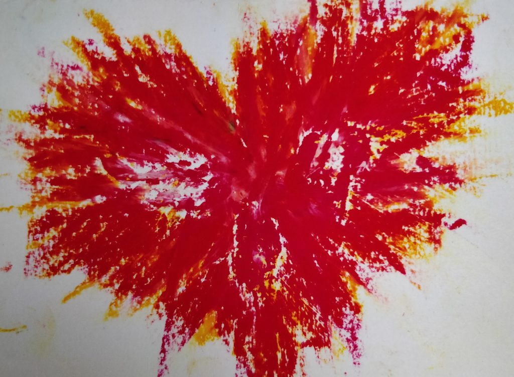 image shows a heart made with oil pastel